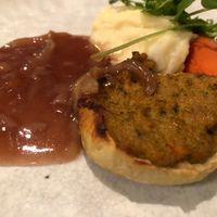 Braised Onion Stuffed with Herb Vegan Sausage, Lyonnaise Sauce, Whole Salt Baked Carrot & Mash at White Rabbit in Todmorden