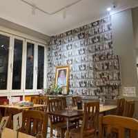 Interior with a framed picture of the 'Supreme Master’  at Easy Vegan in Richmond