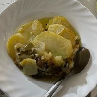 Patatas a lo pobres - translates to poor man’s potatoes. These are delicious and this restaurant is one of the best at making them  at KK's Bar & Restaurant in Nerja