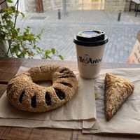 Olive koulouri, baklava and an oat latte  at StoArtos Coffee Bakery in Larnaca