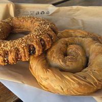 olive-tomato koulouri and spinach pie at StoArtos Coffee Bakery in Larnaca