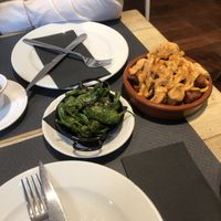 Patatas bravas veganas & pimientos de Padrón   at La Iguana  in Lloret De Mar