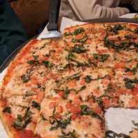 14 inch vegan pizza with tomatoes and basil. at Stone Arch Brew Pub in Appleton