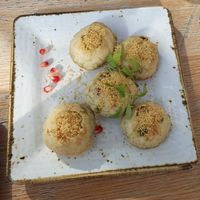 VEGAN DAHI POORI: Wholewheat puffs, Potato chickpea filling, Mint, tamarind & vegan yogurt at Delhi House Cafe in Manchester