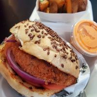 Crunchy burger with fries at Egg Plant in Tijuana