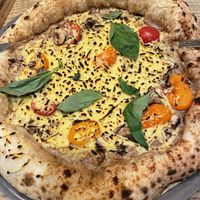 Pizza Piemontese Vegan (19,50€ and too greasy) - dough amazing though   at Strada del Goethe in Munich