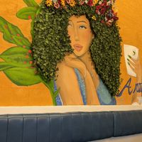 Inside wall art at Aroma Espresso Bar in Miami