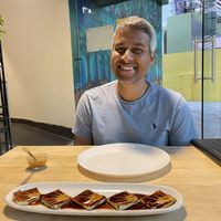 Unique appetizer with a coffee sauce  at The Viridian Plate in Chennai