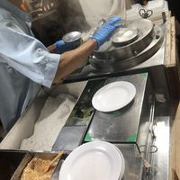 You can watch how they’re being made   at Chinatown Tan's Tutu Coconut Cake - Food Stall in Central Singapore