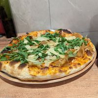 Vegan parmesan and ham pizza at Bella Vita in Strasbourg