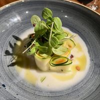 Zucchini Cannelloni (Paprika-Creme, Kräuter-Öl, Mandeln, Wiesenkräuter, Pinienkerne)  at ÜBERLAND in Braunschweig