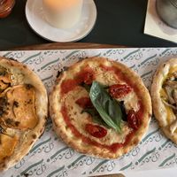 Trio of vegan pizzas on gluten-free crust  at Pico Pizza - Vesterbro in Copenhagen