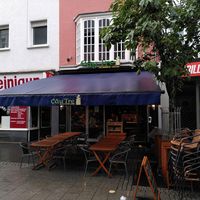 Entrance & outdoor seating at Cay Tre in Bonn