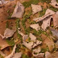 Pizza with pesto, vegan mortadella and tofu!  at Rosso Verace in Alcamo