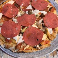 4 veg pizza with added vegan salami  at Rosso Verace in Alcamo