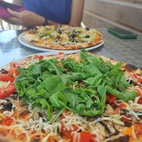 Pizzas 7 and 17 (ask for vegan cheese to make them vegan).   at Pizza Real in Praia Da Luz