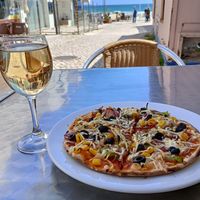 The small size vegetarian pizza with vegan cheese. at Pizza Real in Praia Da Luz