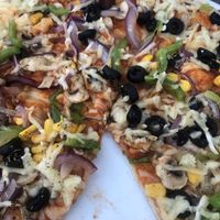 Veggie lovers with vegan cheese  at Pizza Real in Praia Da Luz