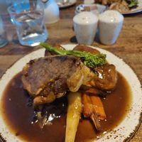 Sausage plait roast dinner at Huggers in Norwich