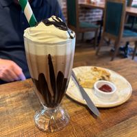Chocolate milkshake with scone and jam at Huggers in Norwich