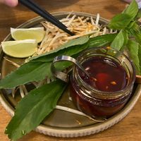 Herbs, shoots and chili sauce to add to the soup  at Phox in Dusseldorf