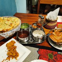 Garlic Naan and Aloo Baigan (potatoe, eggplant) at Harbour Kitchen in Zanzibar
