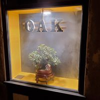 Sign outside at Oak Food Beer & Wine in Coimbra