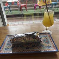 Vegan cactus and potato burrito and maracuyá drink  at Ta'Kool in Sevilla