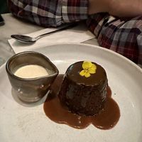 Spiced sticky toffee pudding with vanilla nutmeg cream 😋  at Mildreds - Covent Garden in London