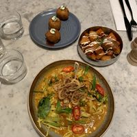 Gf pineapple som gaeng (front); aranchini balls & patatas bravas   at Mildreds - Covent Garden in London