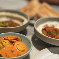 Mildred's sampler first course. Pickled Vegetables, vegetables taktouka whipped mascarpone, salsa macha hummus  at Mildreds - Covent Garden in London