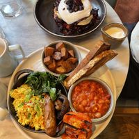 Full English breakfast (below), berries and cream pancakes (above).  at Mildreds - Covent Garden in London