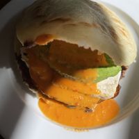 Arepa chevere with tofu instead of cheese. With habanero salsa.  at Kaxapa Factory in Playa Del Carmen