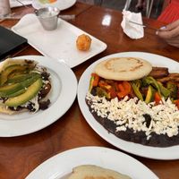 An arepa and a full plate (forgot what it was called)   at Kaxapa Factory in Playa Del Carmen