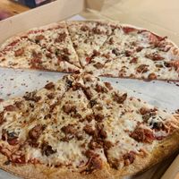 Vegan cheese, plant based sausage, mushrooms, and thin whole grain crust. Delicious!   at Pizza Port - Ocean Beach in San Diego