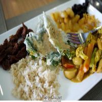 Items from the vegan buffet - vegetable curry, brown rice, crispy kangkong with sesame dip, mock adobo flakes with atsara. at Quantum Cafe in Metro Manila