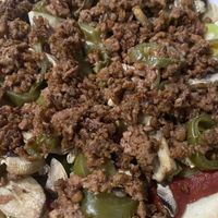 Build your own pizza: impossible sausage, green pepper, jalapeño, mushroom, pizza sauce   at Oggi's - Point Loma in San Diego
