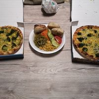 Vegan pizza and salad with pizza bread. at Pizza Haus in Bergkamen