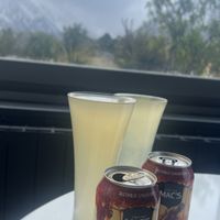 Vegan Ginger Beers with Mt Cook in the background. Believe me, she is there behind the clouds    at The Hermitage Hotel in Mt Cook