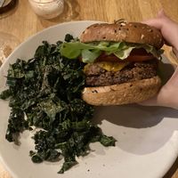 Vegan double cheeseburger w kale salad   at True Food Kitchen in Santa Monica