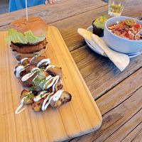 Veggie burger with rustic potatoes (and vegan aioli), Black Bean bowl with guacamole instead of sour cream at Golden Bear Brewing in Mapua