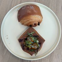 chocolate croissant & pesto pastry (from the storefront)  at Bonjour Patisserie in San Diego