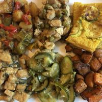 Combo of tofu, tempeh, farinata, and mixed Summer veggies at Gusto Arsizio in Busto Arsizio