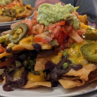 Vegan nachos. Vegan cheese is hand-made from local vegetables at Los Gatos Locos in Ojochal De Osa