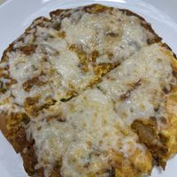 Vegan Santa Fe Pizza with scrambled just egg, vegab chorizo, onions, and peppers with vegan cheeze  at The Lucky Penny Diner and Deli in Naperville