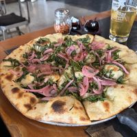Crispy arugula & pickled onions pizzaa  at Iron Goat Brewing in Spokane