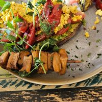 Avo and scrambled tofu on toast with skewer at Sandwi On The Go in Bristol