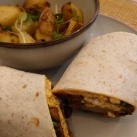 Rise & Shine wrap with herby potatoes at Rise Plant Kitchen + Movement Studio in Malvern