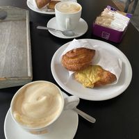 Pastry with raspberry, chocolate, nuts and crema and cappuccini with soja-milk  at Caffè con Tè in Modena