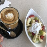 coffee and fruit salad with coconut yogurt   at Mumma Buzz Cafe 'N' Takeaway in Deloraine